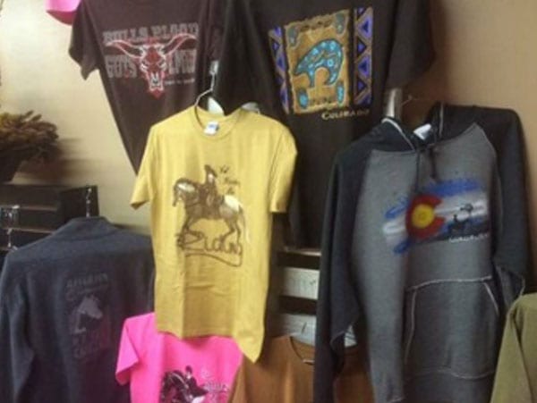 t-shirt in yellow color hanged